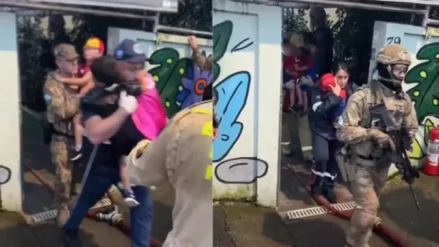 Crianças sendo retiradas por equipes de segurança após o fim de situação com crianças reféns em Curitiba